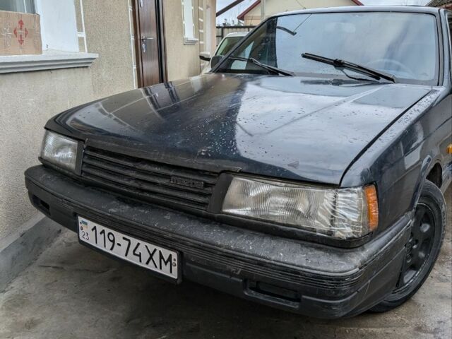 Синий Мазда 929, объемом двигателя 2.2 л и пробегом 413 тыс. км за 700 $, фото 1 на Automoto.ua