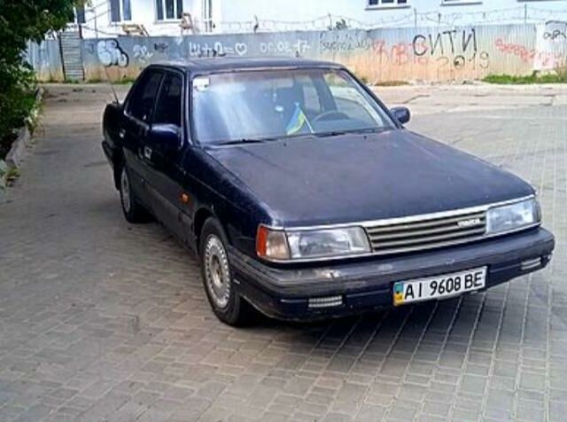 Синій Мазда 929, об'ємом двигуна 3 л та пробігом 300 тис. км за 1500 $, фото 1 на Automoto.ua