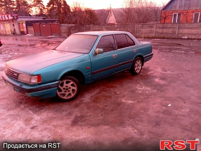 Зеленый Мазда 929, объемом двигателя 2.2 л и пробегом 450 тыс. км за 900 $, фото 1 на Automoto.ua