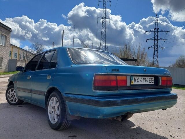 Зеленый Мазда 929, объемом двигателя 2.2 л и пробегом 222 тыс. км за 800 $, фото 1 на Automoto.ua