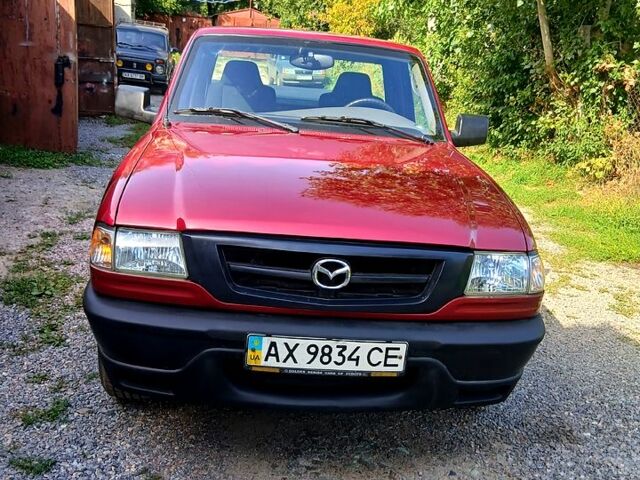 Червоний Мазда Б 2300, об'ємом двигуна 2.3 л та пробігом 8 тис. км за 11000 $, фото 1 на Automoto.ua