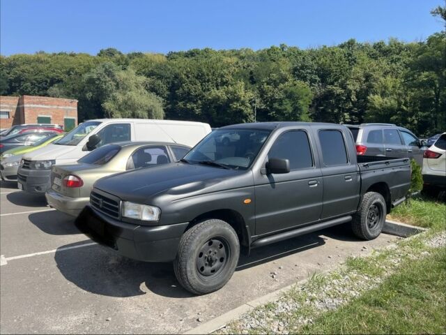 Черный Мазда Б серия, объемом двигателя 2.5 л и пробегом 330 тыс. км за 4000 $, фото 1 на Automoto.ua