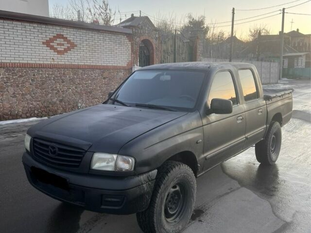 Черный Мазда Б серия, объемом двигателя 2.5 л и пробегом 250 тыс. км за 4200 $, фото 1 на Automoto.ua