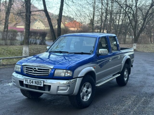 Синий Мазда Б серия, объемом двигателя 2.5 л и пробегом 200 тыс. км за 5500 $, фото 1 на Automoto.ua