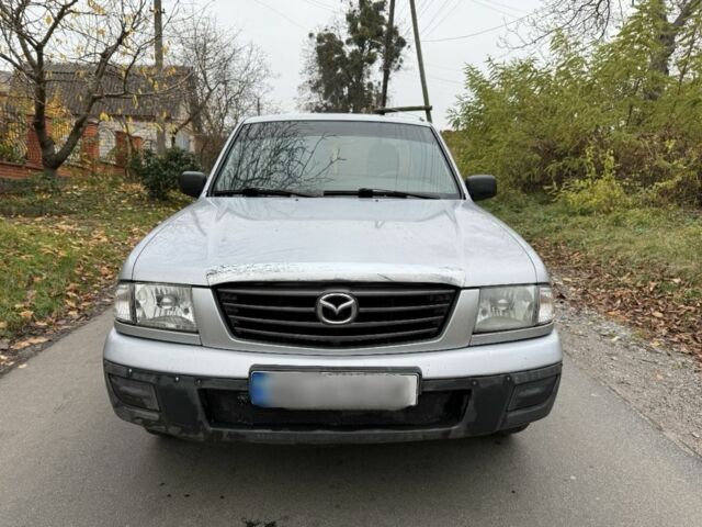 Серый Мазда БТ-50, объемом двигателя 2.5 л и пробегом 240 тыс. км за 3000 $, фото 1 на Automoto.ua