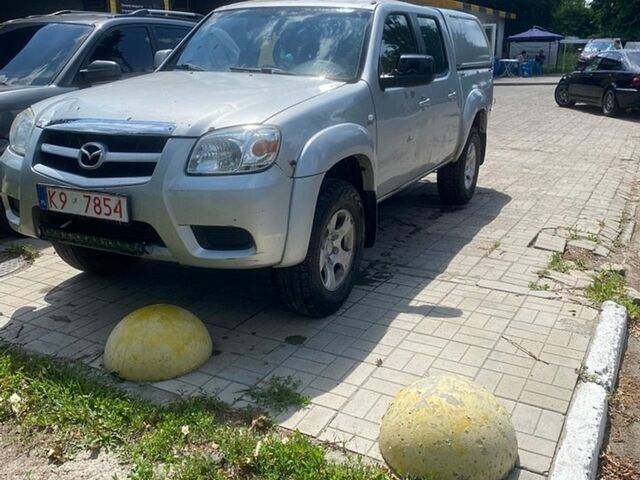 Серый Мазда БТ-50, объемом двигателя 2.5 л и пробегом 299 тыс. км за 4000 $, фото 1 на Automoto.ua