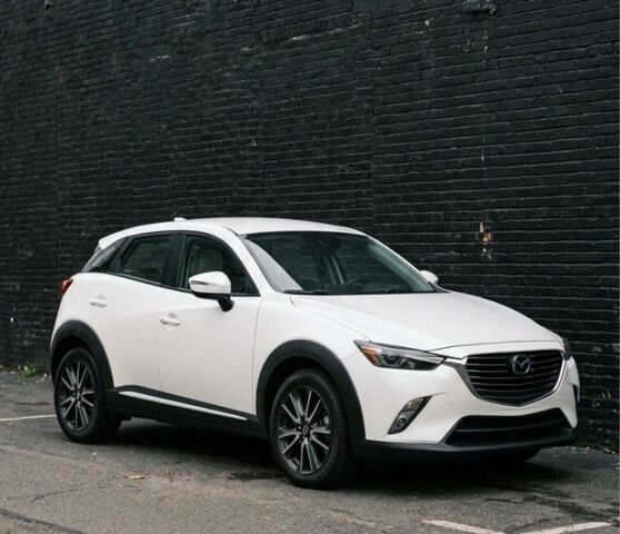 Белый Мазда СХ-3, объемом двигателя 2 л и пробегом 50 тыс. км за 17900 $, фото 1 на Automoto.ua