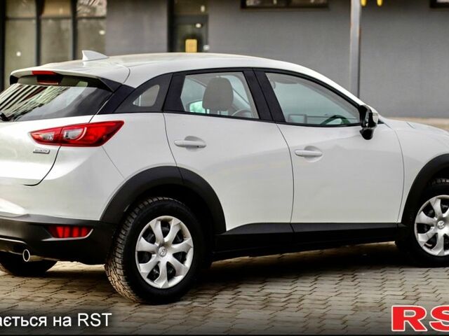 Белый Мазда СХ-3, объемом двигателя 2 л и пробегом 100 тыс. км за 15300 $, фото 1 на Automoto.ua