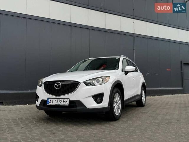 Белый Мазда СХ-5, объемом двигателя 2 л и пробегом 217 тыс. км за 14300 $, фото 1 на Automoto.ua