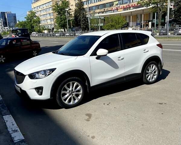 Белый Мазда СХ-5, объемом двигателя 2 л и пробегом 182 тыс. км за 15000 $, фото 1 на Automoto.ua
