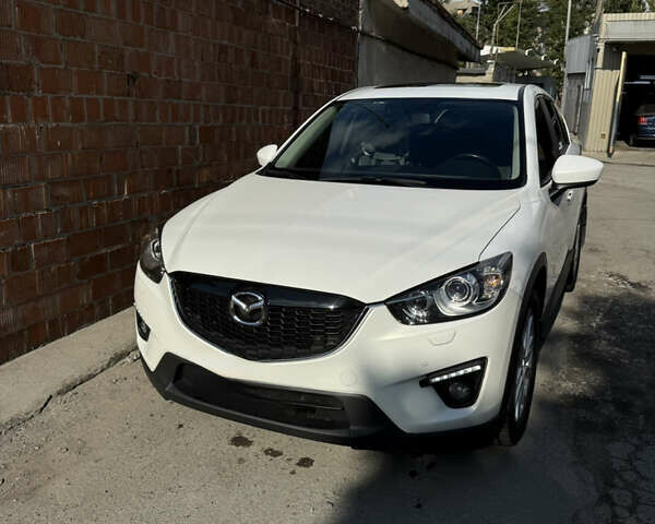 Белый Мазда СХ-5, объемом двигателя 2 л и пробегом 80 тыс. км за 15000 $, фото 1 на Automoto.ua