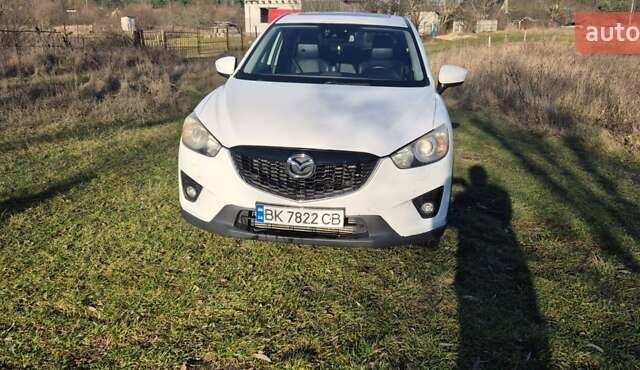 Белый Мазда СХ-5, объемом двигателя 2.19 л и пробегом 250 тыс. км за 13000 $, фото 1 на Automoto.ua