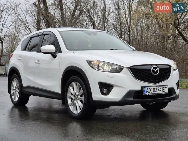 Білий Мазда СХ-5, об'ємом двигуна 2.49 л та пробігом 154 тис. км за 14300 $, фото 1 на Automoto.ua