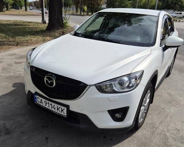 Белый Мазда СХ-5, объемом двигателя 2 л и пробегом 206 тыс. км за 15000 $, фото 1 на Automoto.ua