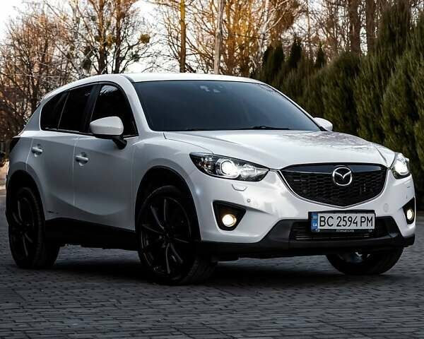 Белый Мазда СХ-5, объемом двигателя 2.19 л и пробегом 256 тыс. км за 15500 $, фото 1 на Automoto.ua