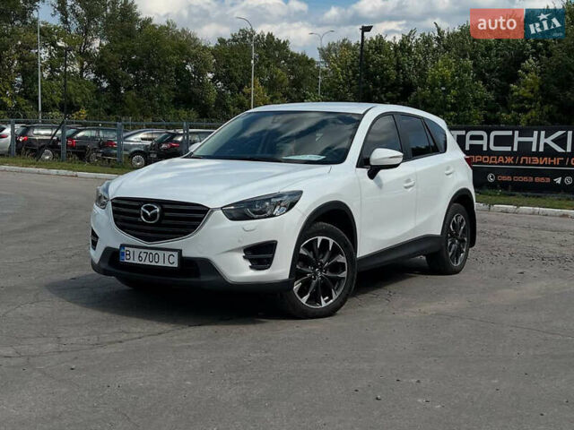 Белый Мазда СХ-5, объемом двигателя 2.19 л и пробегом 225 тыс. км за 15800 $, фото 1 на Automoto.ua