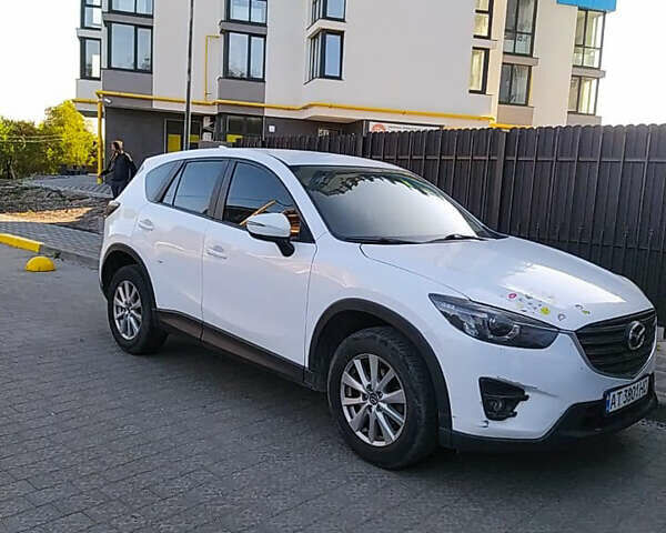 Белый Мазда СХ-5, объемом двигателя 2.49 л и пробегом 130 тыс. км за 13000 $, фото 1 на Automoto.ua