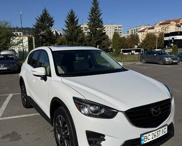 Белый Мазда СХ-5, объемом двигателя 2.5 л и пробегом 92 тыс. км за 15950 $, фото 1 на Automoto.ua