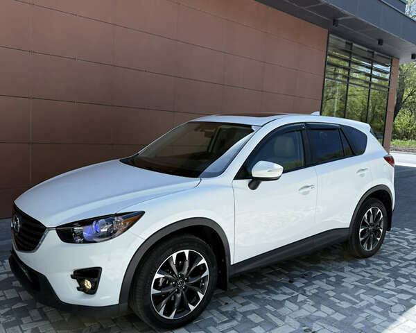 Білий Мазда СХ-5, об'ємом двигуна 2.49 л та пробігом 130 тис. км за 16800 $, фото 1 на Automoto.ua