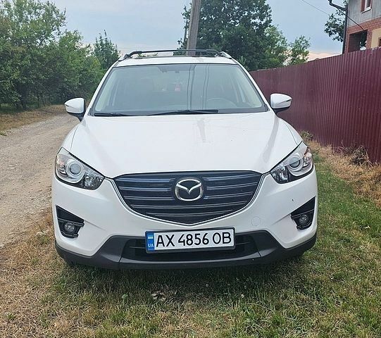 Білий Мазда СХ-5, об'ємом двигуна 2.49 л та пробігом 115 тис. км за 16000 $, фото 1 на Automoto.ua