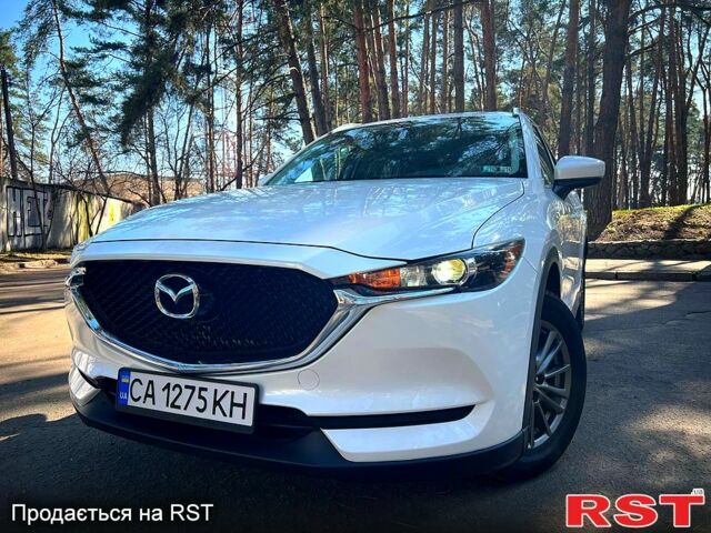 Белый Мазда СХ-5, объемом двигателя 2.5 л и пробегом 144 тыс. км за 17300 $, фото 1 на Automoto.ua
