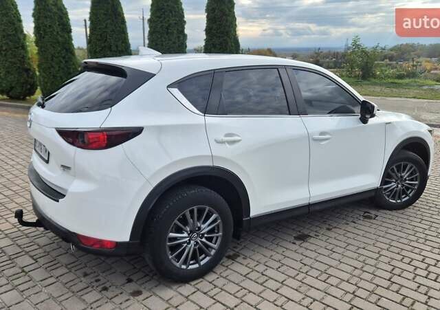 Белый Мазда СХ-5, объемом двигателя 2.19 л и пробегом 262 тыс. км за 16900 $, фото 1 на Automoto.ua