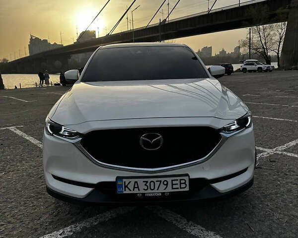Белый Мазда СХ-5, объемом двигателя 2.49 л и пробегом 75 тыс. км за 23000 $, фото 1 на Automoto.ua