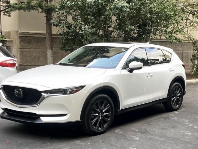 Білий Мазда СХ-5, об'ємом двигуна 2.5 л та пробігом 59 тис. км за 21000 $, фото 1 на Automoto.ua