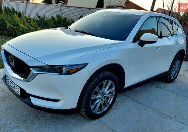 Белый Мазда СХ-5, объемом двигателя 2.49 л и пробегом 97 тыс. км за 23500 $, фото 1 на Automoto.ua