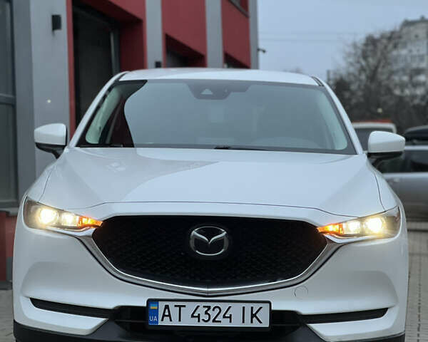 Білий Мазда СХ-5, об'ємом двигуна 2.49 л та пробігом 153 тис. км за 18999 $, фото 1 на Automoto.ua