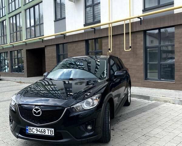 Черный Мазда СХ-5, объемом двигателя 2.2 л и пробегом 202 тыс. км за 13800 $, фото 1 на Automoto.ua