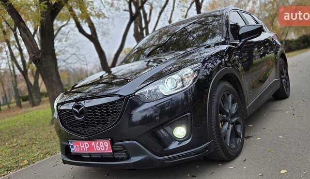 Черный Мазда СХ-5, объемом двигателя 2.2 л и пробегом 150 тыс. км за 16900 $, фото 1 на Automoto.ua
