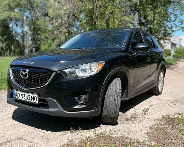 Черный Мазда СХ-5, объемом двигателя 2.49 л и пробегом 190 тыс. км за 14200 $, фото 1 на Automoto.ua