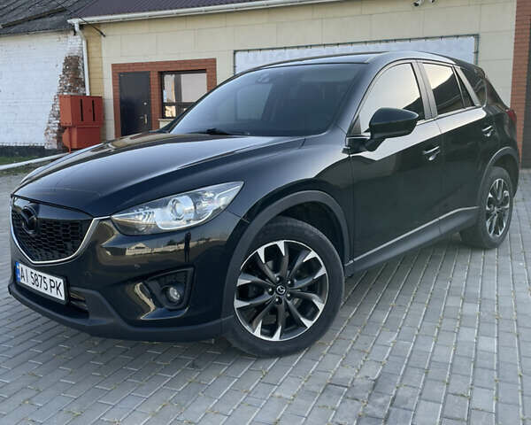 Черный Мазда СХ-5, объемом двигателя 2.2 л и пробегом 235 тыс. км за 14200 $, фото 1 на Automoto.ua