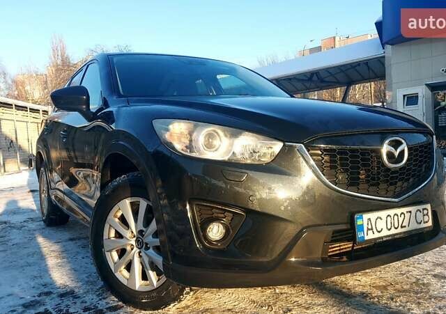Черный Мазда СХ-5, объемом двигателя 2.2 л и пробегом 204 тыс. км за 13000 $, фото 1 на Automoto.ua