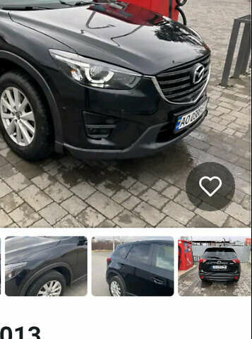 Черный Мазда СХ-5, объемом двигателя 2.19 л и пробегом 278 тыс. км за 12000 $, фото 1 на Automoto.ua