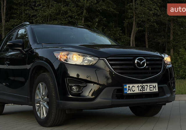Черный Мазда СХ-5, объемом двигателя 2.49 л и пробегом 129 тыс. км за 14950 $, фото 1 на Automoto.ua