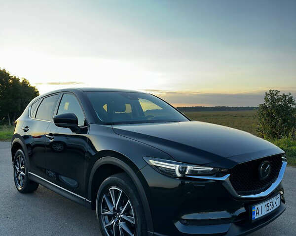 Черный Мазда СХ-5, объемом двигателя 2.49 л и пробегом 107 тыс. км за 21300 $, фото 1 на Automoto.ua