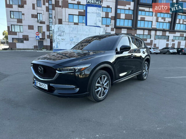 Чорний Мазда СХ-5, об'ємом двигуна 2.49 л та пробігом 75 тис. км за 17700 $, фото 1 на Automoto.ua