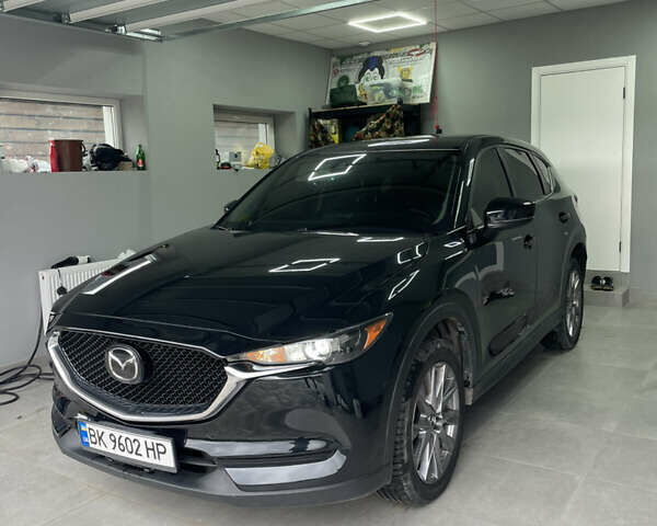 Чорний Мазда СХ-5, об'ємом двигуна 2.49 л та пробігом 134 тис. км за 17650 $, фото 1 на Automoto.ua