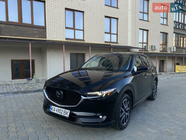 Черный Мазда СХ-5, объемом двигателя 2.5 л и пробегом 165 тыс. км за 18499 $, фото 1 на Automoto.ua