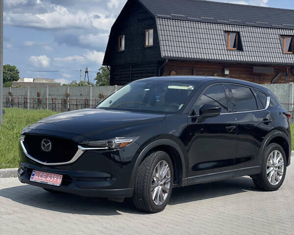 Черный Мазда СХ-5, объемом двигателя 2.5 л и пробегом 145 тыс. км за 19100 $, фото 1 на Automoto.ua