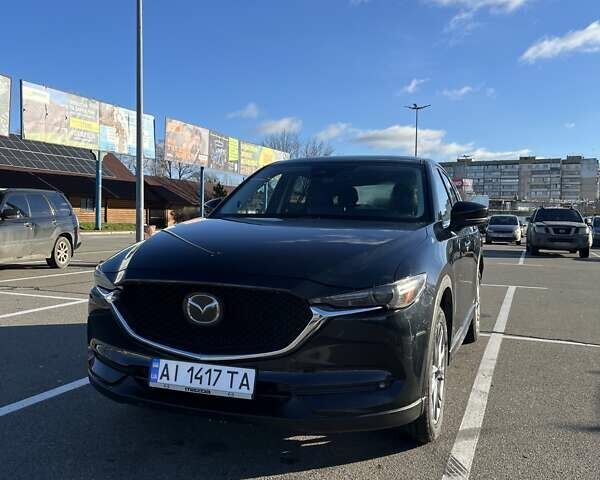 Чорний Мазда СХ-5, об'ємом двигуна 2.49 л та пробігом 132 тис. км за 21500 $, фото 1 на Automoto.ua