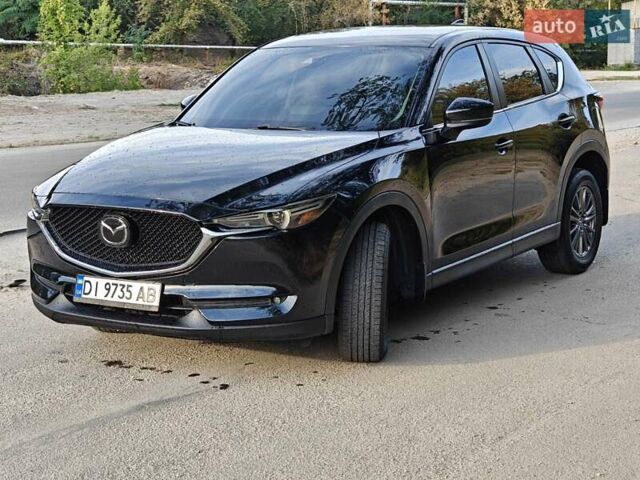 Черный Мазда СХ-5, объемом двигателя 2.49 л и пробегом 106 тыс. км за 21600 $, фото 1 на Automoto.ua