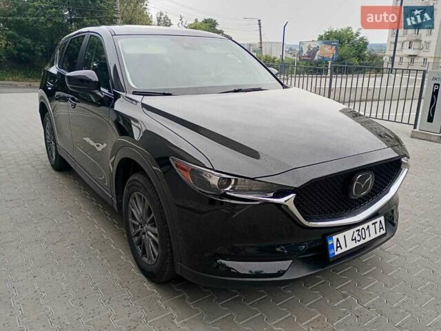 Черный Мазда СХ-5, объемом двигателя 2.49 л и пробегом 57 тыс. км за 22700 $, фото 1 на Automoto.ua