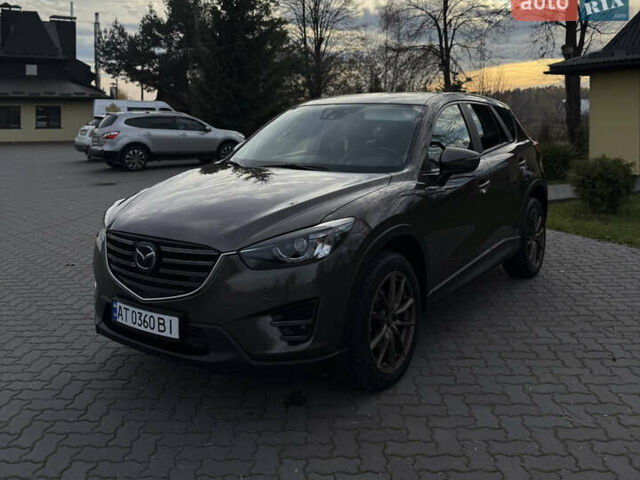 Коричневый Мазда СХ-5, объемом двигателя 2.2 л и пробегом 200 тыс. км за 16850 $, фото 1 на Automoto.ua