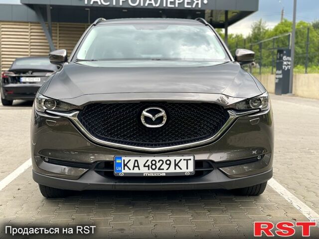 Коричневый Мазда СХ-5, объемом двигателя 2.5 л и пробегом 71 тыс. км за 22000 $, фото 1 на Automoto.ua