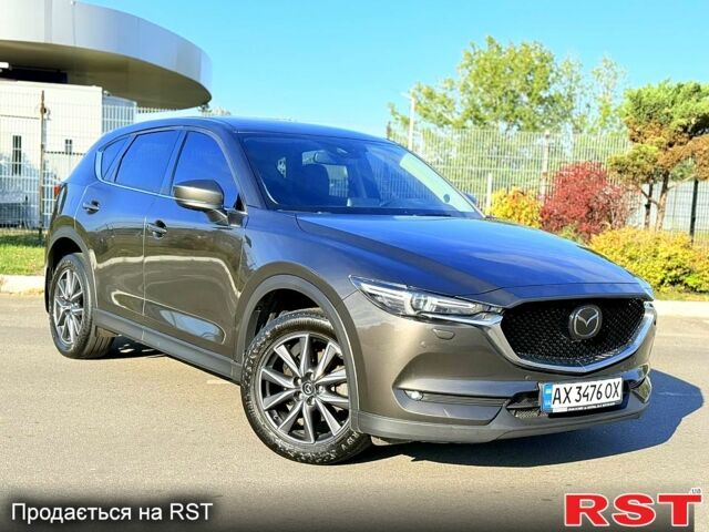 Коричневый Мазда СХ-5, объемом двигателя 2.2 л и пробегом 245 тыс. км за 21500 $, фото 1 на Automoto.ua