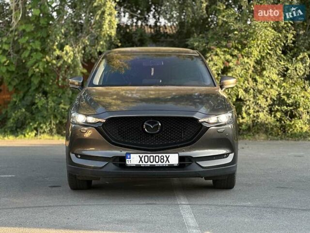 Коричневый Мазда СХ-5, объемом двигателя 2.49 л и пробегом 130 тыс. км за 25000 $, фото 1 на Automoto.ua