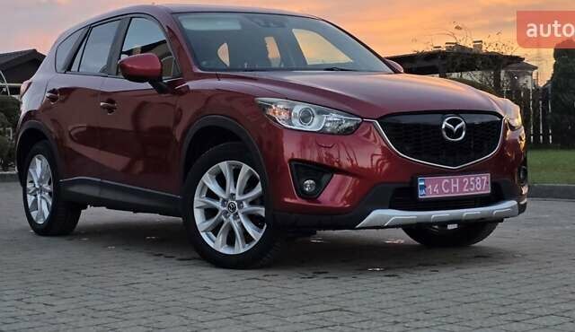 Красный Мазда СХ-5, объемом двигателя 2.2 л и пробегом 190 тыс. км за 13500 $, фото 1 на Automoto.ua